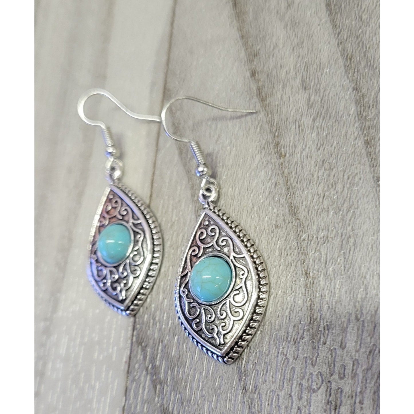 Silver and turquoise dangle earrings