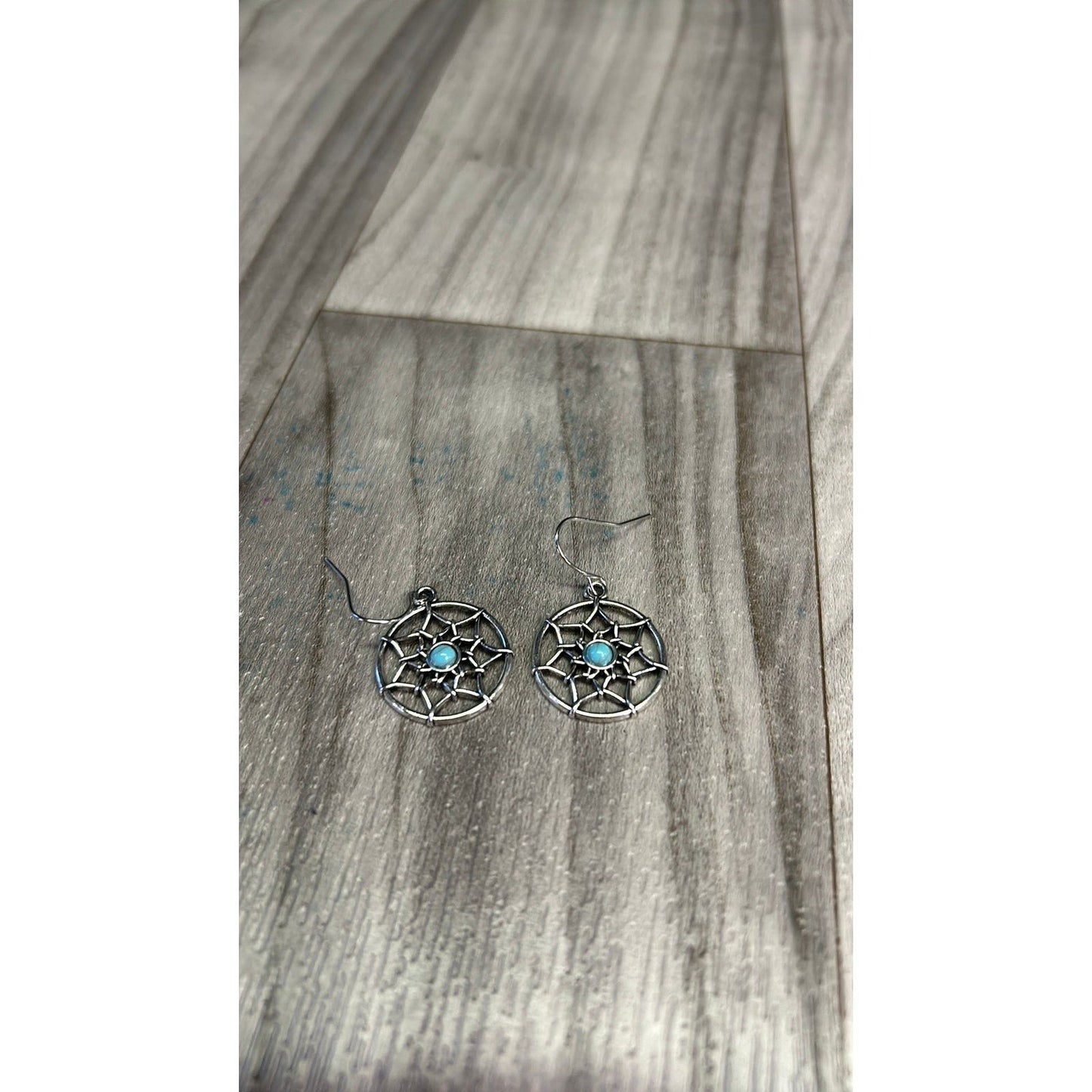 Spider web earrings