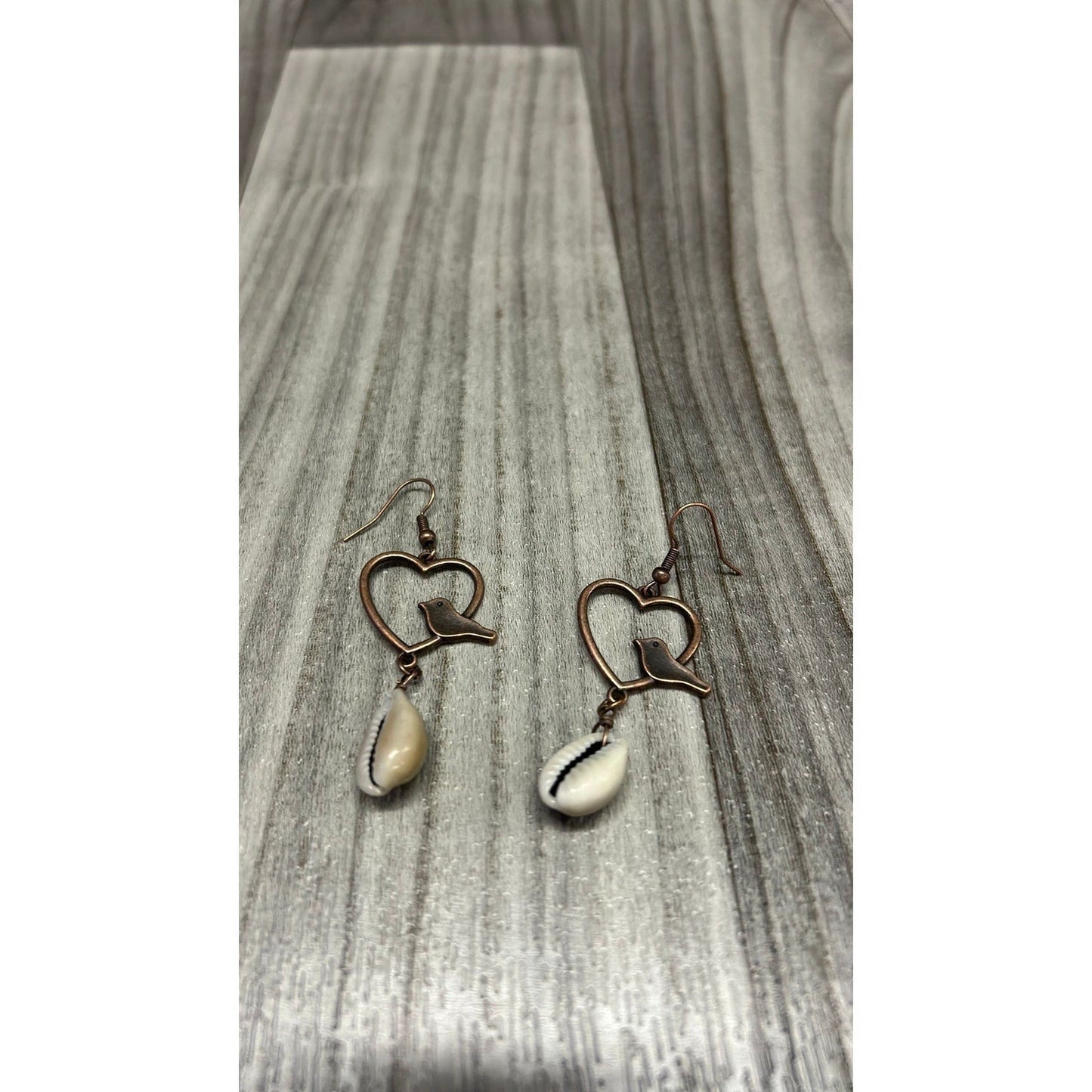 Heart with bird seashells earrings