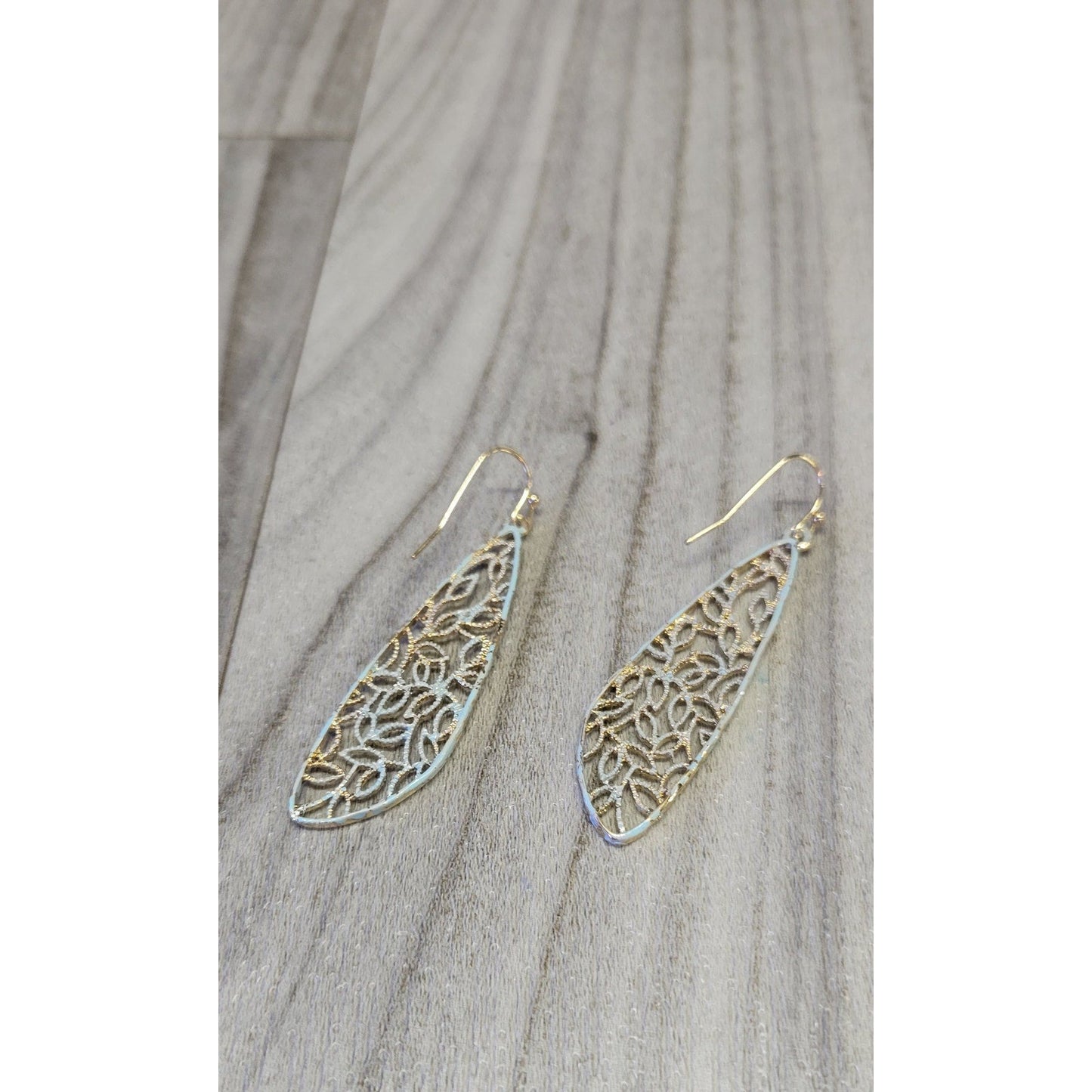 gold and light blue tone earrings