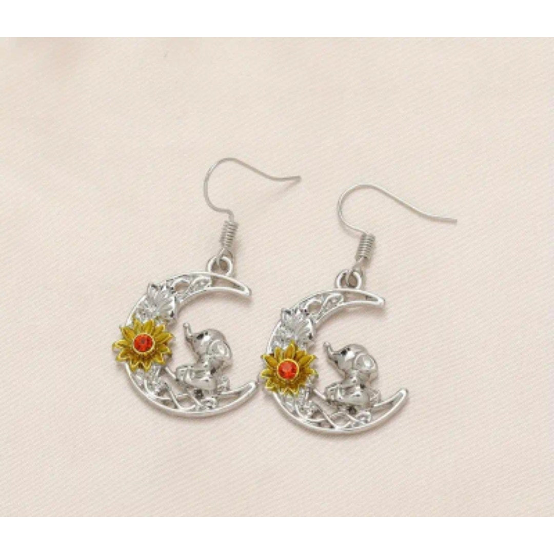 Elephant sitting on moon with sun earrings
