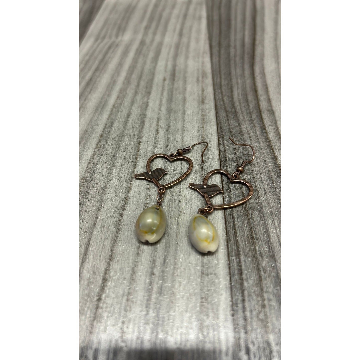 Heart with bird seashells earrings